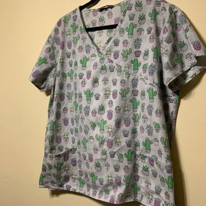 Light gray scrub top with succulents on it